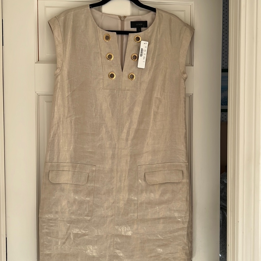 JCREW :Fabric is linen, glazed with a matte gold finish. Brushed gold grommets: